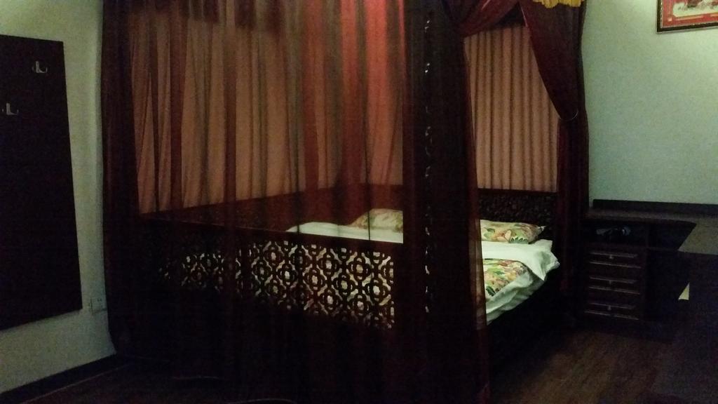 בייג'ינג Tiananmen Best Year Courtyard Hotel חדר תמונה